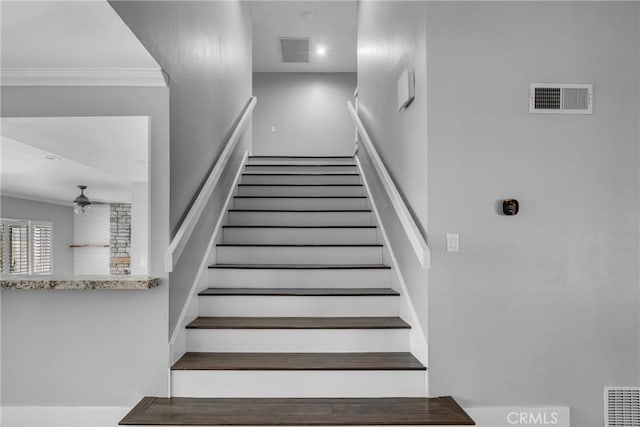 3652 San Joaquin Ave, Los Alamitos, CA 90720 - stairway featuring a ceiling fan and ornamental molding