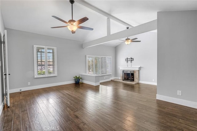 3652 San Joaquin Ave, Los Alamitos, CA 90720 - unfurnished living room featuring a ceiling fan, healthy amount of natural light, and a fireplace with raised hearth