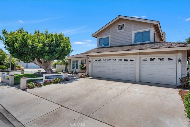 3652 San Joaquin Ave, Los Alamitos, CA 90720 - traditional home with an attached garage and driveway