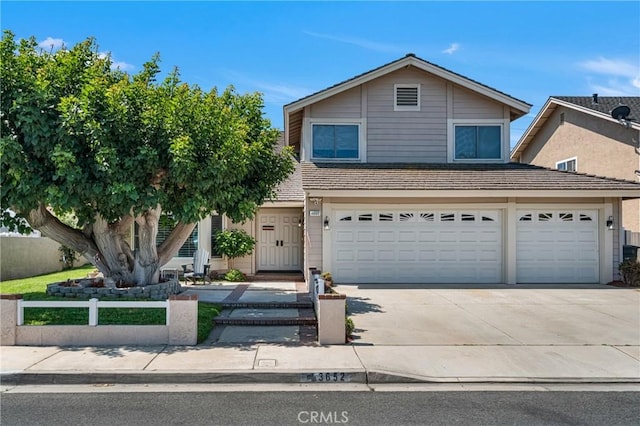 3652 San Joaquin Ave, Los Alamitos, CA 90720 - traditional home featuring concrete driveway and a garage