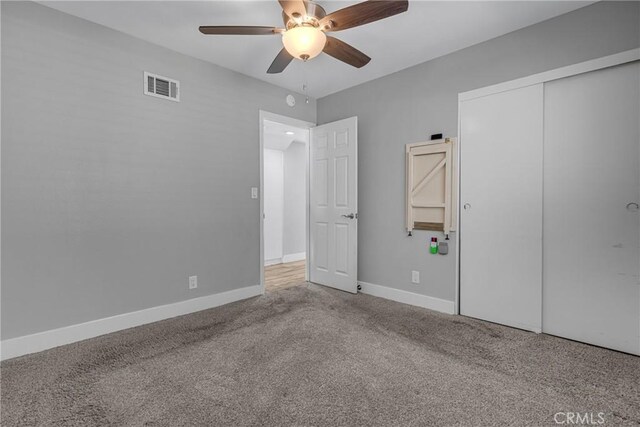 3652 San Joaquin Ave, Los Alamitos, CA 90720 - unfurnished bedroom featuring carpet, a closet, and a ceiling fan