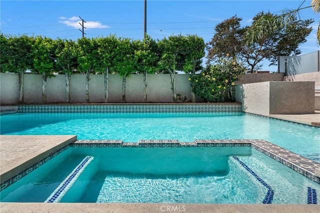 3652 San Joaquin Ave, Los Alamitos, CA 90720 - view of swimming pool featuring a pool with connected hot tub
