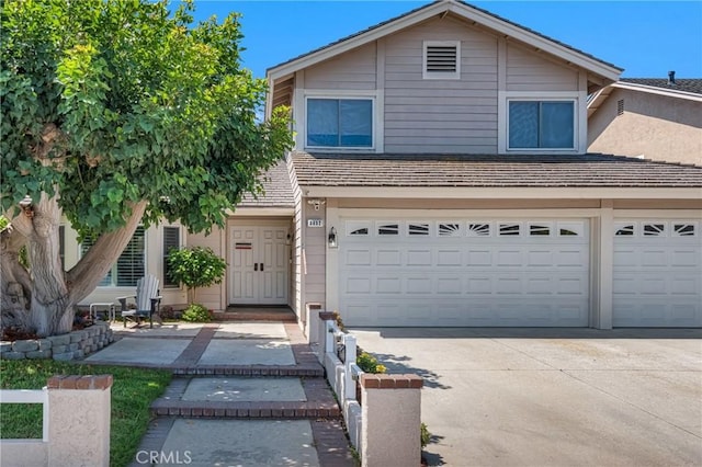 3652 San Joaquin Ave, Los Alamitos, CA 90720 - traditional-style home with concrete driveway and an attached garage