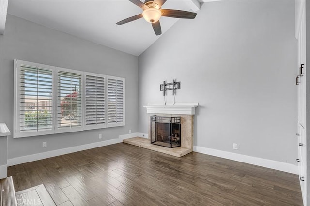 3652 San Joaquin Ave, Los Alamitos, CA 90720 - unfurnished living room with lofted ceiling, a ceiling fan, a fireplace with raised hearth, and wood finished floors