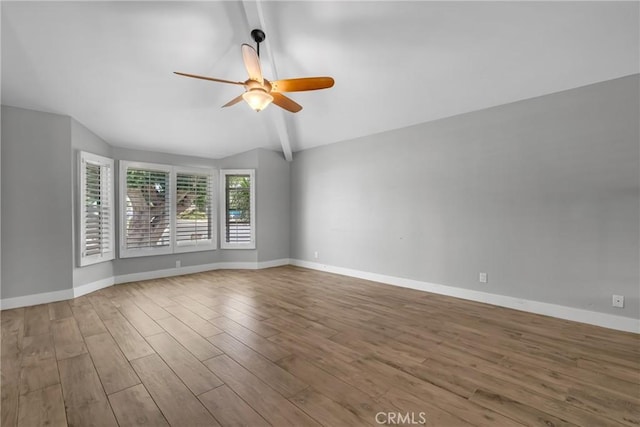 3652 San Joaquin Ave, Los Alamitos, CA 90720 - empty room with lofted ceiling, ceiling fan, and wood finished floors