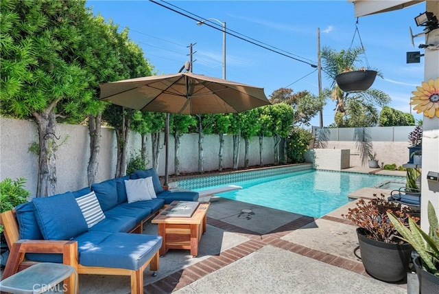 3652 San Joaquin Ave, Los Alamitos, CA 90720 - view of swimming pool with an outdoor hangout area, a fenced backyard, a patio, and a diving board
