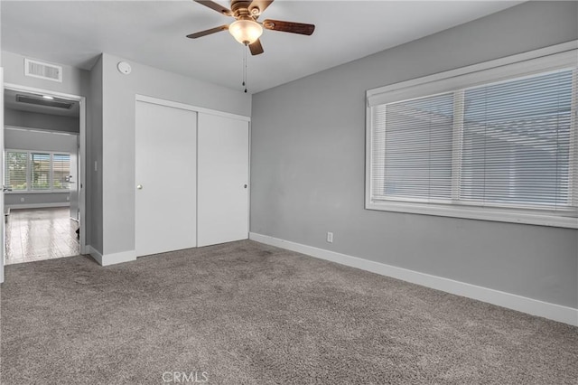 3652 San Joaquin Ave, Los Alamitos, CA 90720 - unfurnished bedroom with carpet, a closet, and ceiling fan