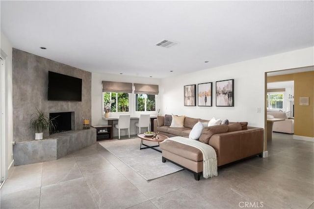 26356 Sorrell Pl, Laguna Hills, CA 92653 - living area with plenty of natural light and a fireplace