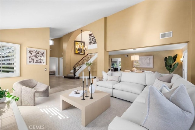 26356 Sorrell Pl, Laguna Hills, CA 92653 - living area with stairway, high vaulted ceiling, and arched walkways