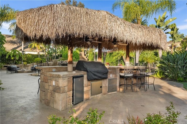 26356 Sorrell Pl, Laguna Hills, CA 92653 - view of patio featuring exterior kitchen, a gazebo, and a ceiling fan