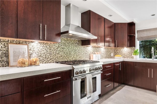 26356 Sorrell Pl, Laguna Hills, CA 92653 - kitchen with high end range, wall chimney exhaust hood, open shelves, light tile patterned flooring, and backsplash