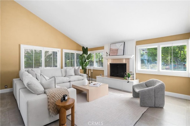 26356 Sorrell Pl, Laguna Hills, CA 92653 - tiled living room featuring a fireplace with raised hearth and high vaulted ceiling