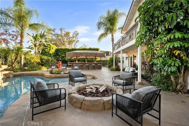 26356 Sorrell Pl, Laguna Hills, CA 92653 - patio / terrace with a patio area, an outdoor living space with a fire pit, and an outdoor pool