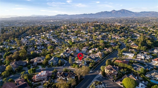 26356 Sorrell Pl, Laguna Hills, CA 92653 - aerial view of property's location with a mountainous background and nearby suburban area