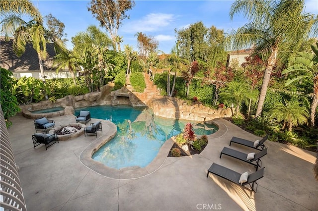 26356 Sorrell Pl, Laguna Hills, CA 92653 - swimming pool featuring an in-ground hot tub, a patio, and an outdoor fire pit