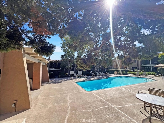 13722 Red Hill Ave Unit 15, Tustin, CA 92780 - community pool featuring a patio area