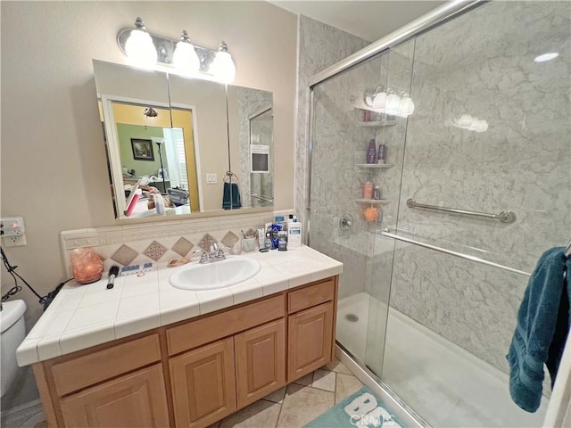 13722 Red Hill Ave Unit 15, Tustin, CA 92780 - full bath with vanity, a shower stall, ensuite bathroom, backsplash, and tile patterned floors