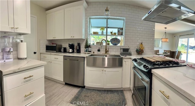 1349 Beech Hill Ave, Hacienda Heights, CA 91745 - kitchen featuring stainless steel appliances, wall chimney exhaust hood, decorative backsplash, and white cabinets