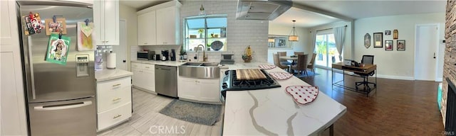1349 Beech Hill Ave, Hacienda Heights, CA 91745 - kitchen with stainless steel appliances, white cabinets, decorative backsplash, light wood-style flooring, and light stone countertops