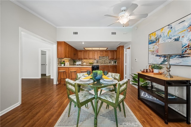 13311 Twin Hills Rd Unit 55H, Seal Beach, CA 90740 - dining room with ornamental molding, dark wood-type flooring, and a ceiling fan