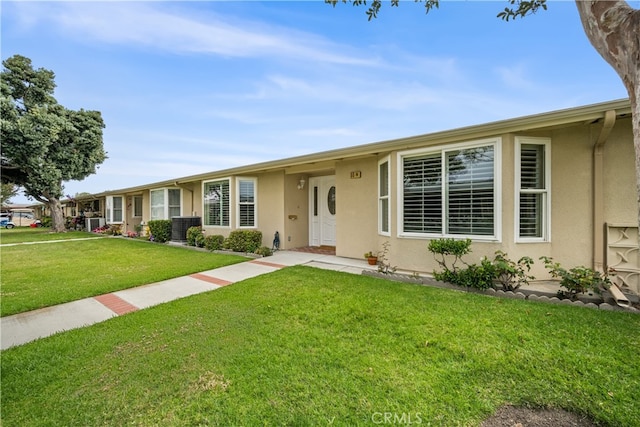 13311 Twin Hills Rd Unit 55H, Seal Beach, CA 90740 - ranch-style home with stucco siding and a front yard