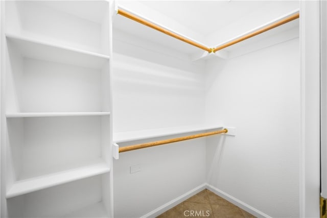13311 Twin Hills Rd Unit 55H, Seal Beach, CA 90740 - walk in closet with tile patterned flooring