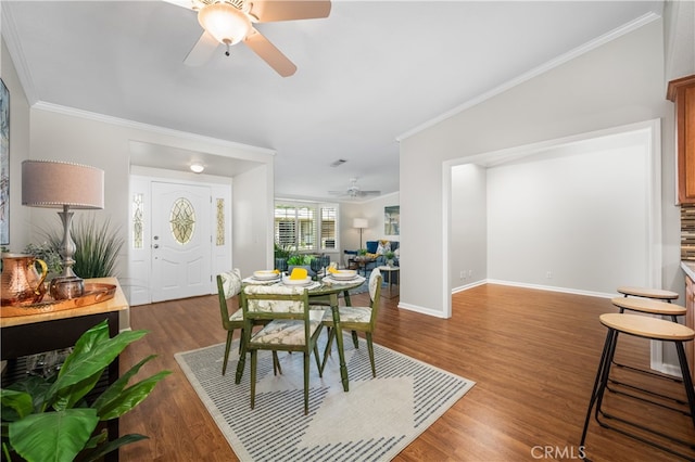 13311 Twin Hills Rd Unit 55H, Seal Beach, CA 90740 - dining room featuring ceiling fan, wood finished floors, and ornamental molding