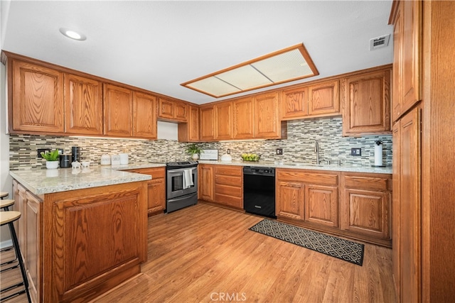 13311 Twin Hills Rd Unit 55H, Seal Beach, CA 90740 - kitchen featuring stainless steel electric range oven, dishwasher, brown cabinets, backsplash, and light wood finished floors