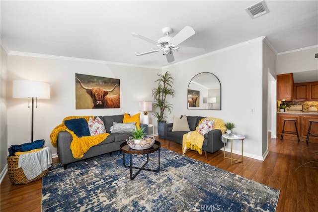 13311 Twin Hills Rd Unit 55H, Seal Beach, CA 90740 - living room with wood finished floors, ornamental molding, and ceiling fan