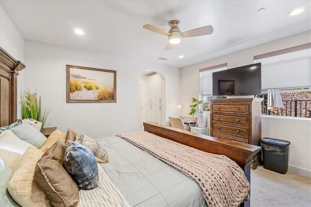 1009 Price Canyon Rd, Pismo Beach, CA 93449 - carpeted bedroom with arched walkways, ceiling fan, and recessed lighting