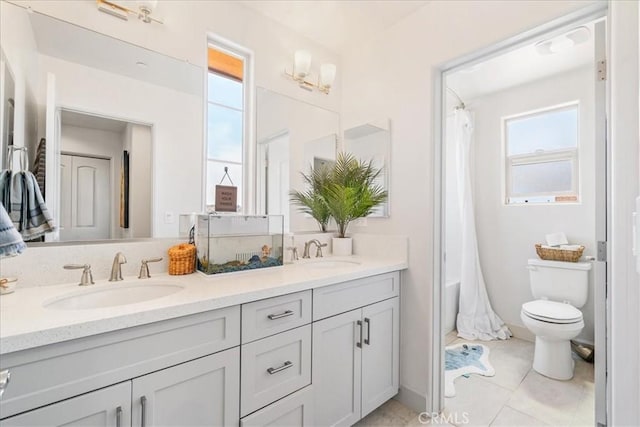 1009 Price Canyon Rd, Pismo Beach, CA 93449 - bathroom featuring double vanity, tile patterned floors, and shower / tub combo