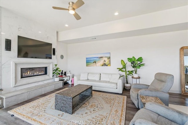 1009 Price Canyon Rd, Pismo Beach, CA 93449 - living area featuring ceiling fan, wood finished floors, a glass covered fireplace, and recessed lighting