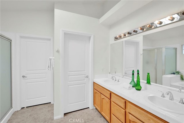 11246 Pleasant Hills Dr, Apple Valley, CA 92308 - full bath featuring a stall shower, double vanity, and tile patterned floors