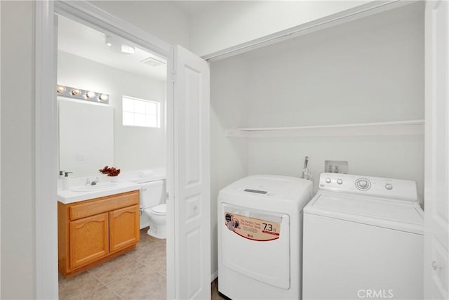 11246 Pleasant Hills Dr, Apple Valley, CA 92308 - laundry room featuring washer and clothes dryer