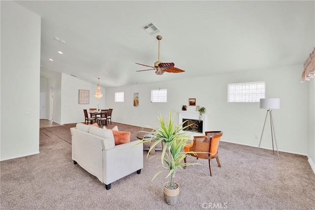 11246 Pleasant Hills Dr, Apple Valley, CA 92308 - carpeted living area featuring a ceiling fan, a fireplace, recessed lighting, and lofted ceiling