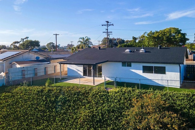 4143 Cole Way, San Diego, CA 92117 - rear view of property featuring stucco siding, a fenced backyard, and roof with shingles