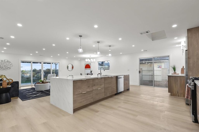 4143 Cole Way, San Diego, CA 92117 - kitchen featuring modern cabinets, open floor plan, recessed lighting, light wood-type flooring, and a spacious island