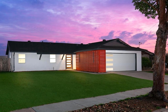 4143 Cole Way, San Diego, CA 92117 - view of front of home featuring stucco siding, an attached garage, and driveway