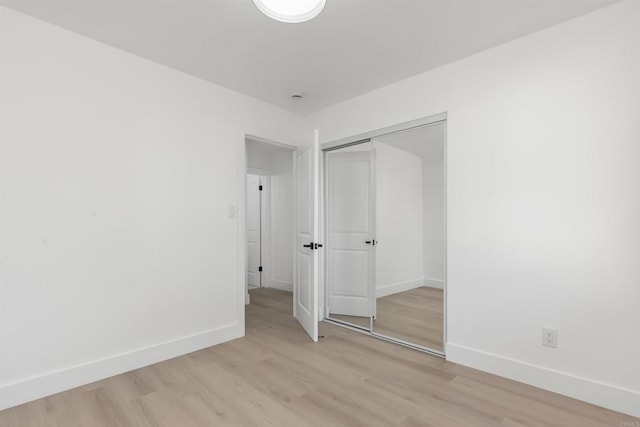 4143 Cole Way, San Diego, CA 92117 - unfurnished bedroom featuring light wood-style floors and a closet