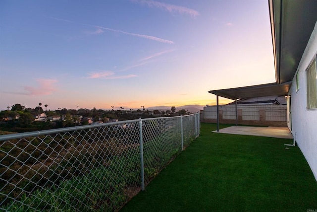 4143 Cole Way, San Diego, CA 92117 - yard at dusk featuring a fenced backyard and a patio area