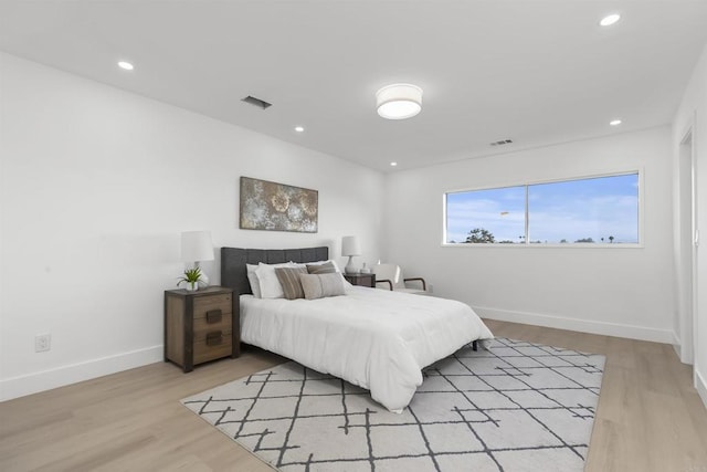 4143 Cole Way, San Diego, CA 92117 - bedroom with light wood-type flooring and recessed lighting