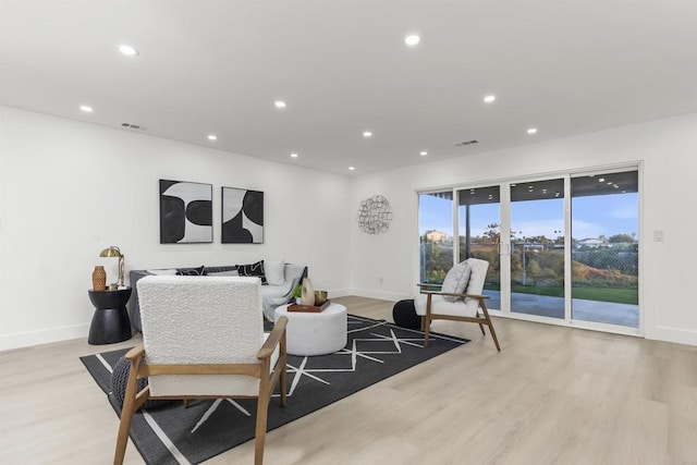 4143 Cole Way, San Diego, CA 92117 - living room featuring recessed lighting and light wood-style floors