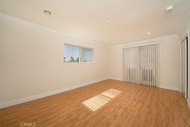 8851 Sonora Rd, Phelan, CA 92371 - empty room featuring light wood-type flooring, crown molding, a smoke detector, and recessed lighting