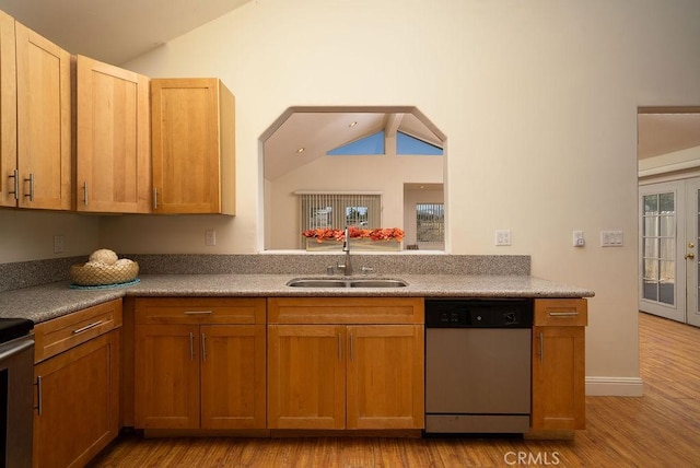 8851 Sonora Rd, Phelan, CA 92371 - kitchen with dishwasher, vaulted ceiling, and wood finished floors