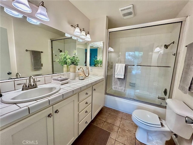 4242 Stansbury Ave Unit 203, Sherman Oaks, CA 91423 - full bath featuring vanity, enclosed tub / shower combo, and tile patterned flooring