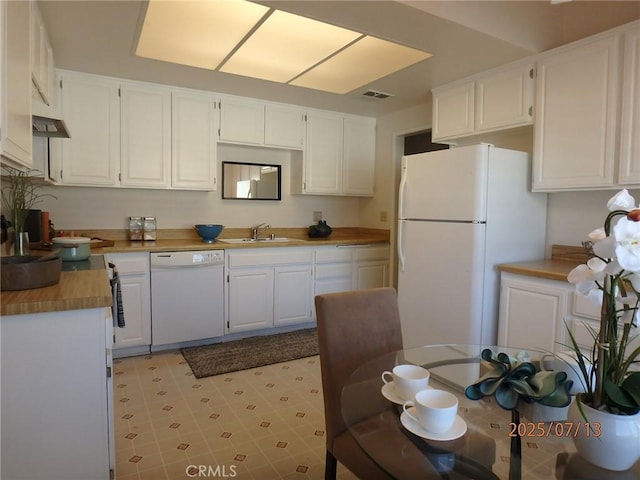 4242 Stansbury Ave Unit 203, Sherman Oaks, CA 91423 - kitchen with white appliances, white cabinets, and light countertops
