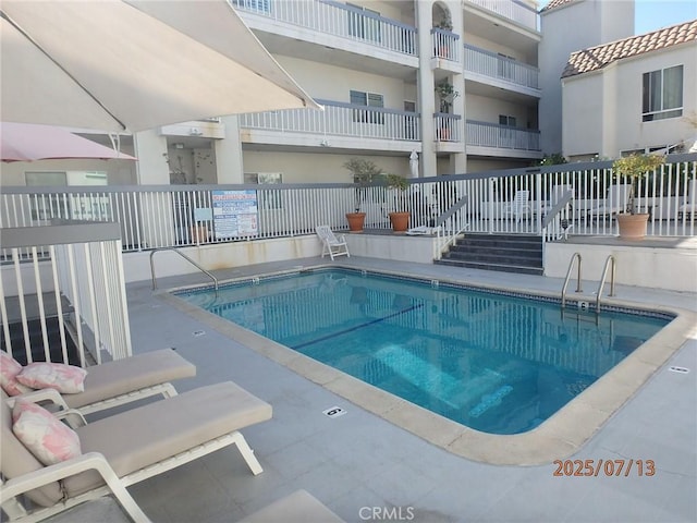 4242 Stansbury Ave Unit 203, Sherman Oaks, CA 91423 - community pool featuring a patio