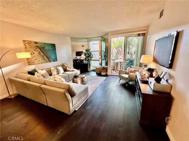 4242 Stansbury Ave Unit 203, Sherman Oaks, CA 91423 - living room featuring dark wood-style flooring and a textured ceiling
