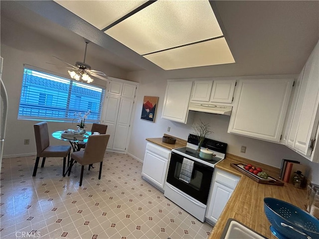 4242 Stansbury Ave Unit 203, Sherman Oaks, CA 91423 - kitchen featuring electric range, white cabinets, under cabinet range hood, ceiling fan, and light countertops
