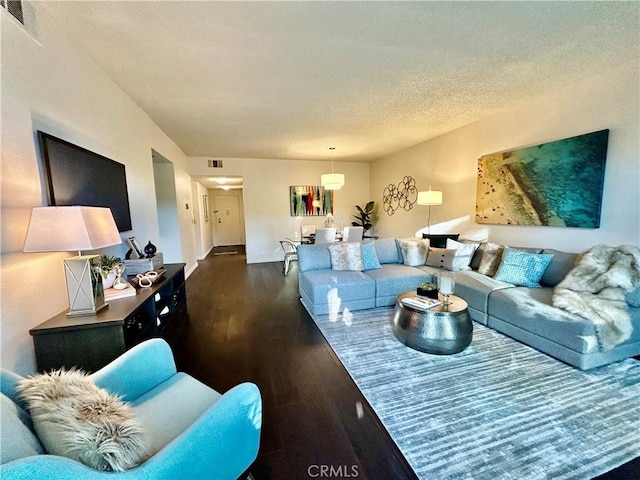 4242 Stansbury Ave Unit 203, Sherman Oaks, CA 91423 - living room with dark wood finished floors and baseboards